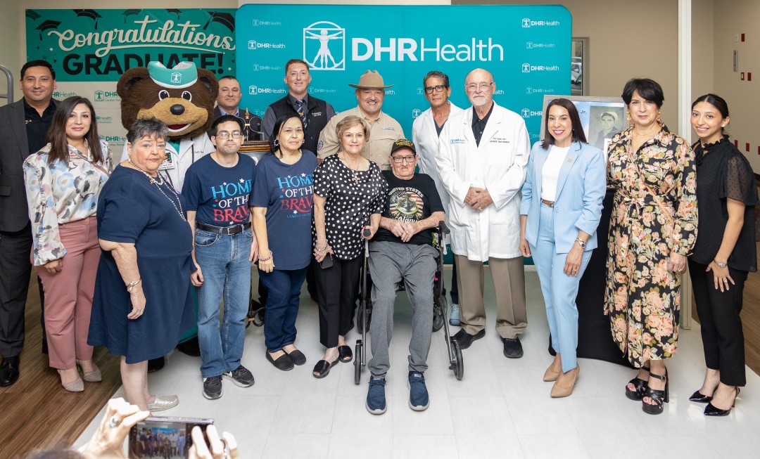 Mr. Bazan With Family DHR Health And Elected Officials